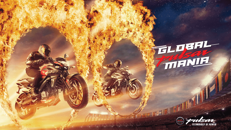 Pulsar NS 160 leaping through fire hoop in Pulsarmania event